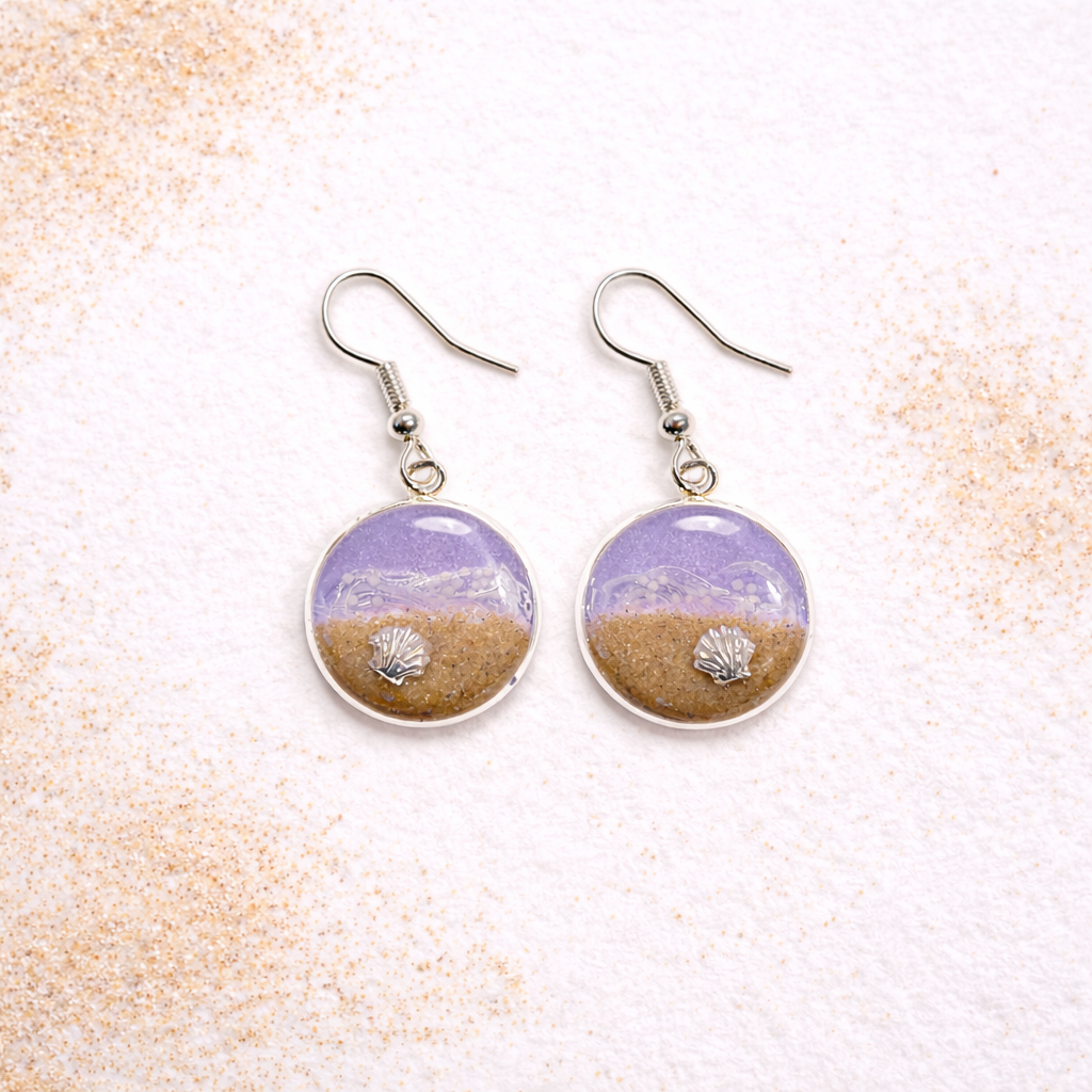 Purple resin beach earrings with sand and shell charm on silver hooks