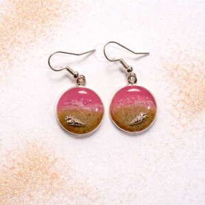 Pink resin beach earrings with sand and shell charm on silver hooks