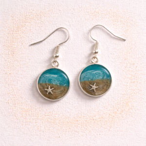 Turquoise resin beach earrings with sand and shell charm on silver hooks