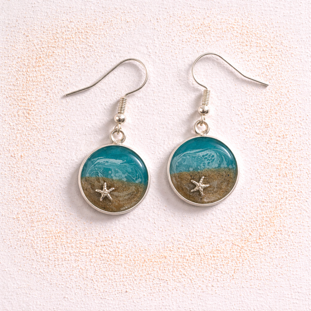 Turquoise resin beach earrings with sand and shell charm on silver hooks