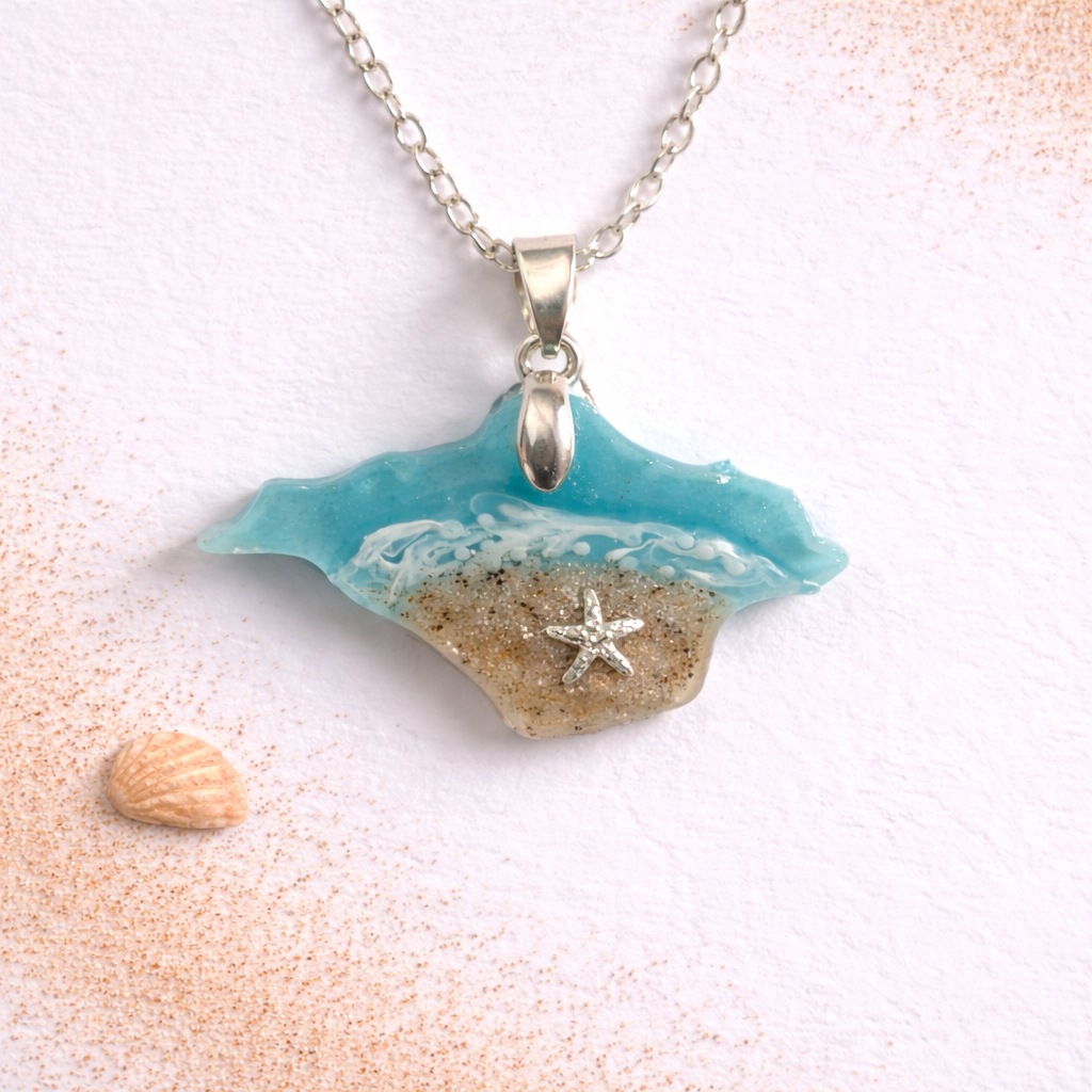 Turquoise Isle of Wight resin necklace with real beach sand and starfish charm on silver chain
