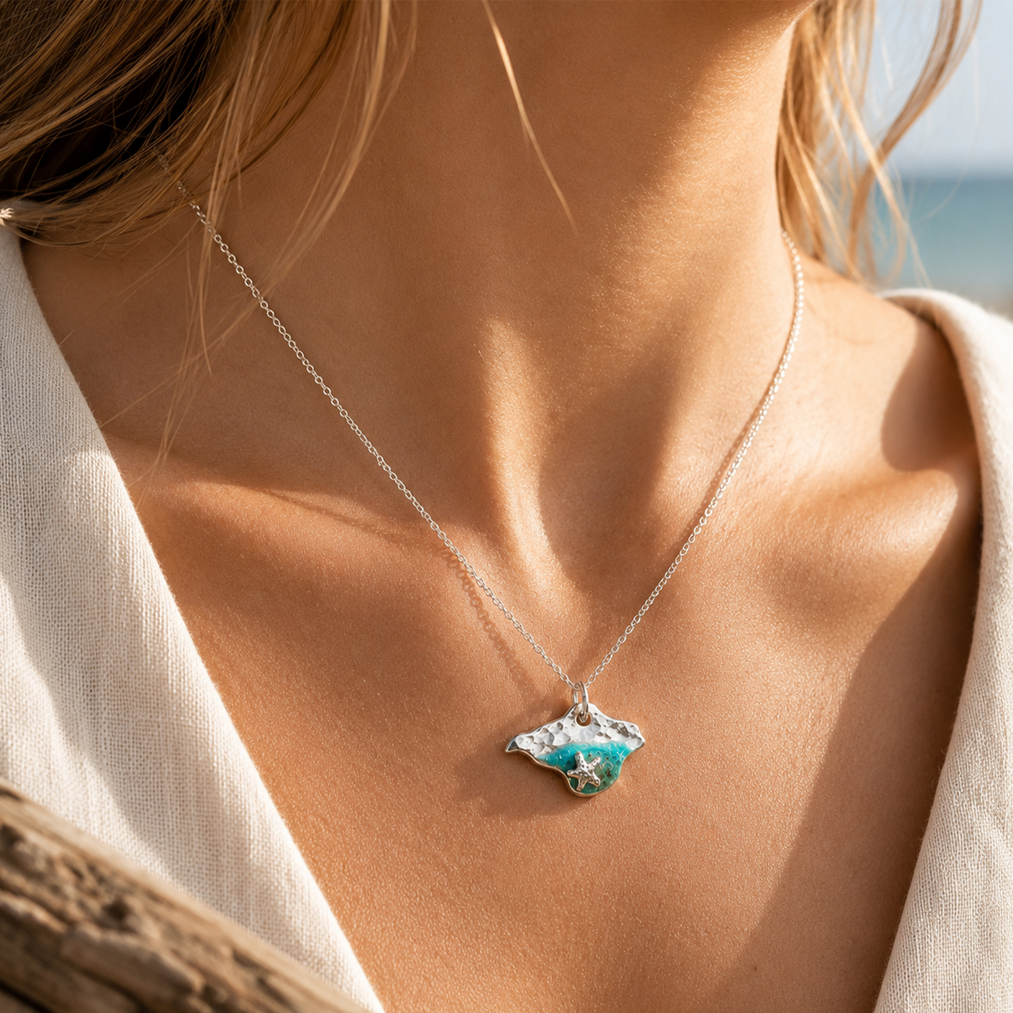 Isle of Wight silver and resin necklace worn on beach