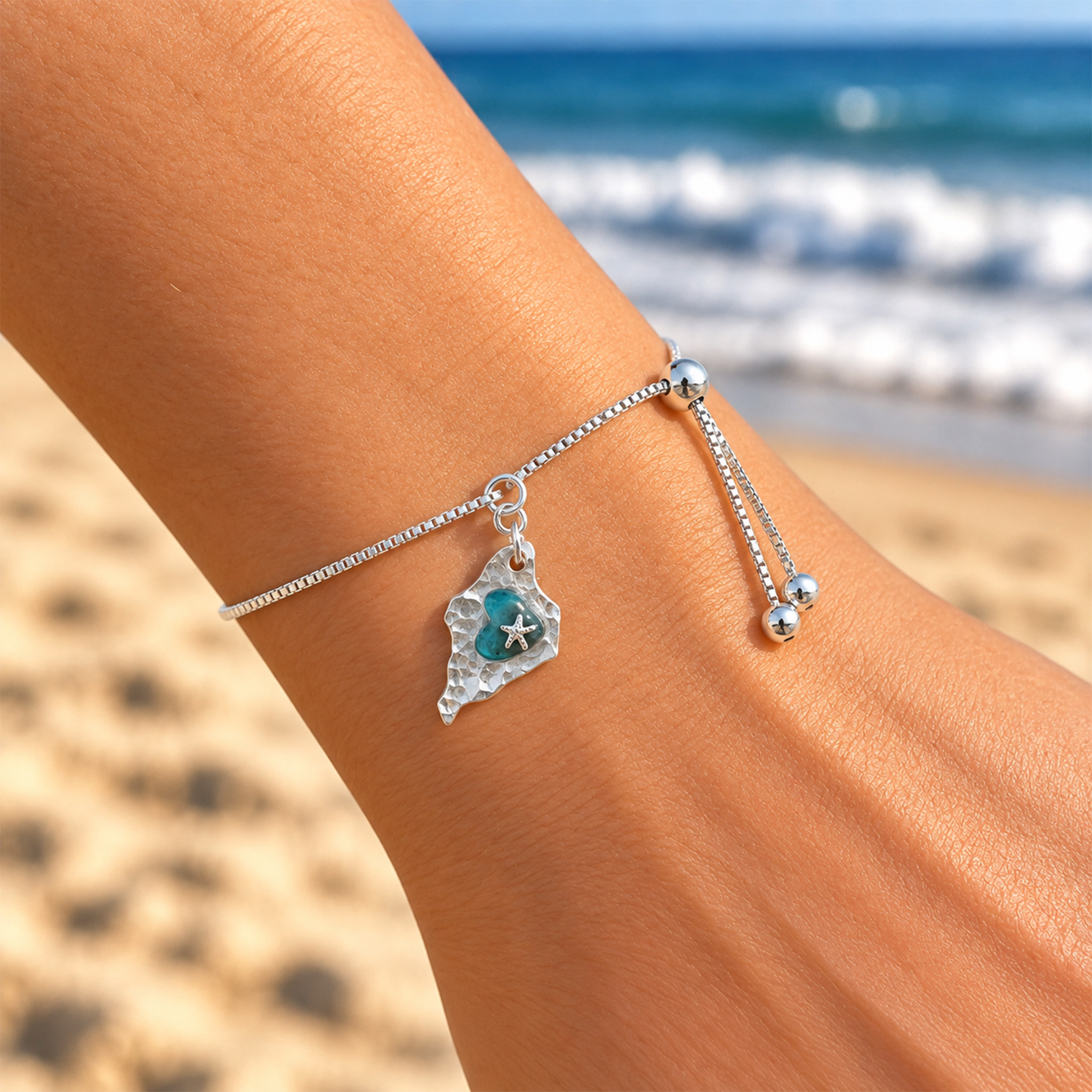 Isle of Wight Silver Heart Detail Adjustable Bracelet worn on beach