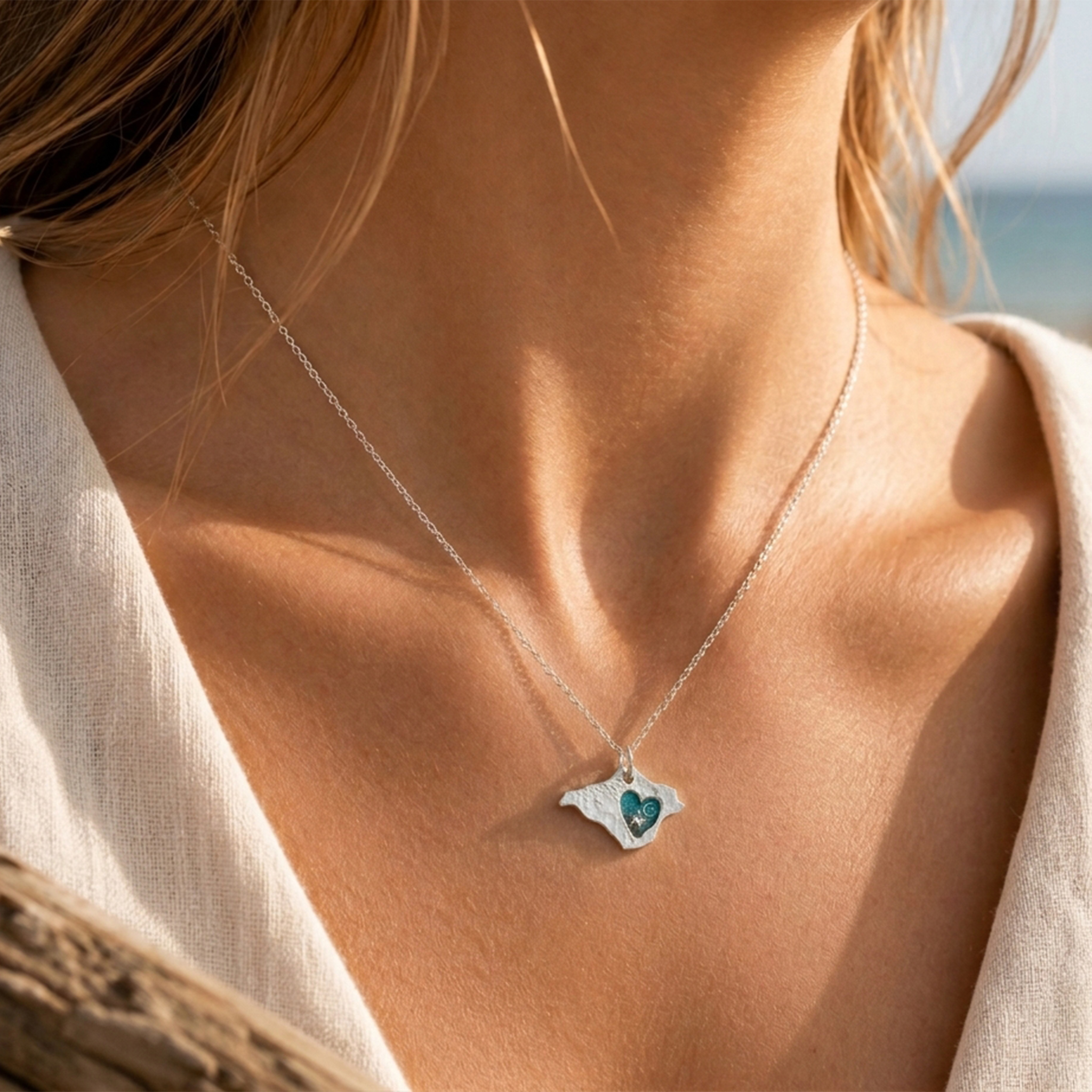 Isle of Wight-Silver Heart Detail Necklace worn on beach
